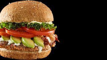 Classic Crispy Chicken Sandwich · 690 calories. Crispy chicken breast, lettuce, tomatoes, red onions, mayo, toasted bun.