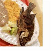 Mojarra A La Diabla · whole fish topped with sautéed shrimp, fish, bell peppers, onion, jalapeños and a la diabla ...