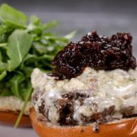 Black And Blue Burger · Grilled grass-fed beef, sweet onion jam, blue cheese, crisp arugula, and creamy dill ranch o...