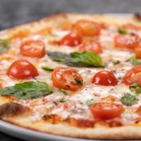 Pizza Margherita · Tomato sauce, mozzarella, fresh tomatoes, basil