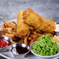 Fish & Chips · Crispy beer-battered cod, hand-cut fries, and mushy peas with malt vinegar tartar sauce