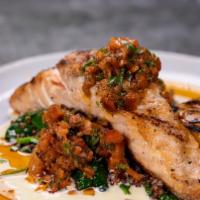 Salmon & Spinach · Grilled salmon with saut ed spinach and quinoa, sweet pepper and tomato relish, and lemon cr...