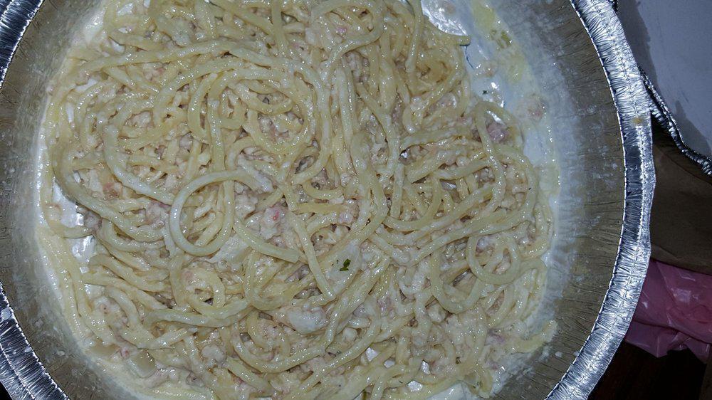 Spaghetti Carbonara · Pancetta bacon, sautéed onions, imported Romano cheese in a cream sauce.