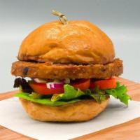 Veggie Burger · Tomato, lettuce, red onion, and aioli on brioche.
