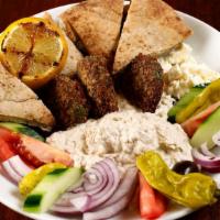 Mediterranean Plate · Vegetarian. Hummus, feta cheese, tomato, kalamata olives, onion, cucumbers, pepperoncini, ho...