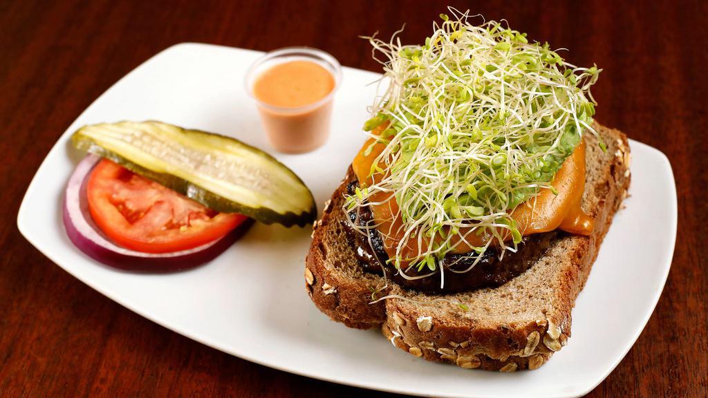 Sunshine · Avocado, sprouts, cheddar, and tomato on a whole wheat toast.
