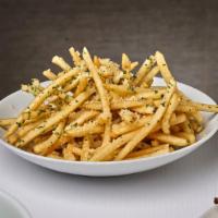 Truffle French Fries · Tossed in truffle oil, parsley, sea salt, parmesan cheese.