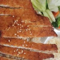 Chicken Katsu Plate · Our chicken katsu is made with chicken breast, breaded in Japanese bread crumbs, fried, and ...