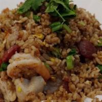 House Fried Rice · Shrimp, chicken (white meat), pork, sausage, egg, peas and carrots