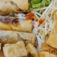 Delish Crispy Roll With Vermicelli · Vermicelli rice noodles with fried and green onions topping. Served with fresh lettuce, mint...