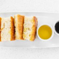 Artisanal Focaccia · Homemade focaccia bread modena vinegar olive oil.