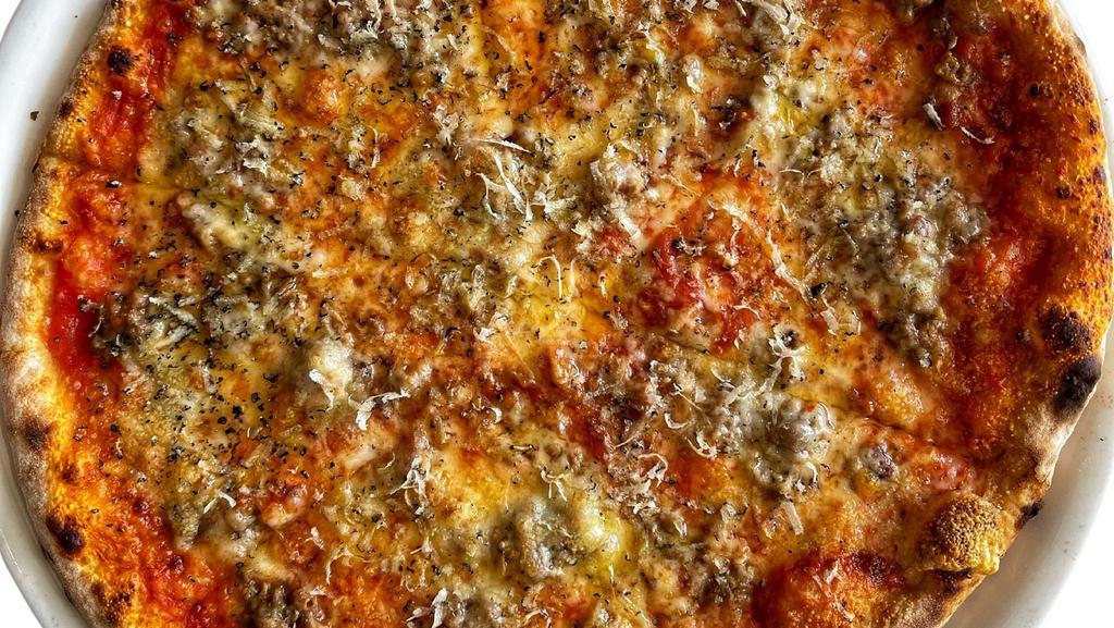 Once Upon A Time A Lasagna Became A Truffled Pizza · Shaved Black Truffle, Bolognese sauce, Fontina Cheese, Parmigiano-Reggiano aged 24M.