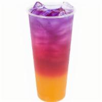 Sunset Iced Tea · A vibrant and refreshing iced tea made with beautiful layers of Butterfly Pea Tea, Hibiscus ...