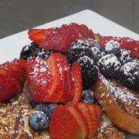 Gluten Free French Toast  · Topped with fresh berries.