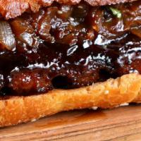 Bbq Beef Sandwich · Thinly Sliced Roast Beef with BBQ Sauce on a Toasted Roll