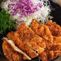 Chicken Katsu · Chicken tender cutlet served with rice, miso soup and cabbage salad.