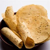 Pappadums · Crispy, spiced, deep fried chickpea flour discs. So crunchy and light!