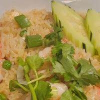 Pineapple Fried Rice    · Fried rice with meat, shrimp, egg, onion, cashew nuts, pineapple, raisins, scallion, and cur...