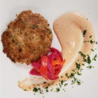 Crab Cake Appetizer · One lump crab cake served with our house-made Louis sauce.