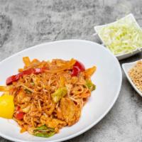 Burmese Style Pad Thai · Chef ‘s choice. Tofu, chicken or shrimps, flat rice noodle, onion, bell peppers, lettuce, ca...