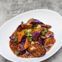 Eggplant With Garlic Sauce · Tender eggplant with garlic, basil and scallions cooked in a sweet chili sauce.