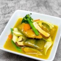 Pumpkin Curry With Vegetables · Sweet pumpkin curry with garlic onion, cabbage, potatoes, carrot, broccoli.