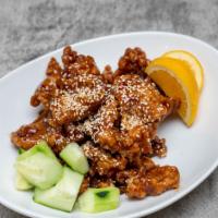 Sesame Chicken · Chef's choice. Deep fried chicken tossed with a sweet and tangy sauce, sesame seeds on top.