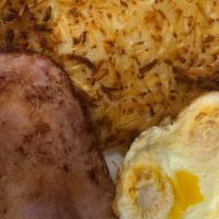 Ham And Eggs · A juicy cut out of ham served with 3 eggs cooked your way and potatoes and toast.