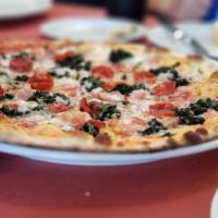 Romana Pizza · Tomato sauce, mozzarella, anchovies, oregano, capers.