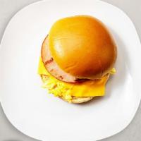 Humming Ham Breakfast Sandwich · Ham, scrambled egg, and cheddar cheese served on your choice of bread.