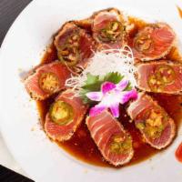 Spicy Sesame Tuna · Seared tuna served with chili oil in ponzu sauce