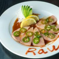 Escolar Razor · Thinly sliced escolar sashimi topped with jalapenos served in ponzu