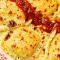 Four-Cheese Ravioli · Pesto Alfredo Sauce