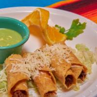 Taquitos (3) · Beef or chicken. Rolled and fried tacos in corn tortillas.