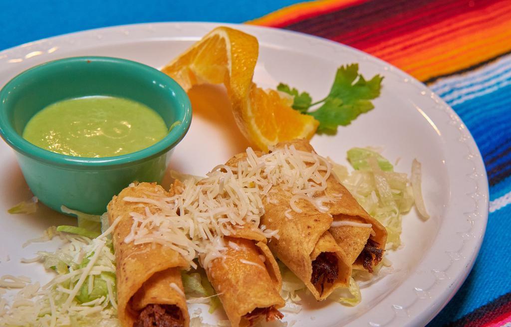 Taquitos (3) · Beef or chicken. Rolled and fried tacos in corn tortillas.
