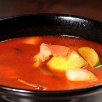 Caldo De Pescado Y Camaron · Fish and shrimp soup.