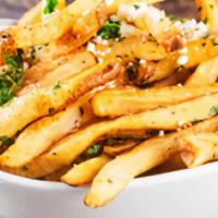 Garlic Fries · One pound of thin cut, skin on fries, loaded with fresh garlic.