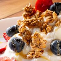 Granola Bowl · Nonfat greek yogurt, seasonal fruit, and organic granola.