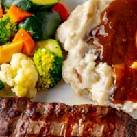 7 Oz Flat Iron Steak Dinner · 7-ounce aged CERTIFIED ANGUS BEEF flat iron steak with your choice of side. (Best served wit...