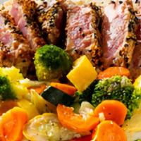Sesame Crusted Ahi Dinner · Sesame crusted tuna fillet, seared and served with your choice of side (Served best with wil...