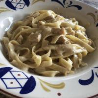 Chicken Fettuccine Alfredo · Fettuccine pasta. Served with chicken breast in alfredo sauce.