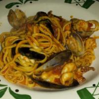 Linguine Alla Riviera · Linguine pasta. Served with clam, mussels, shrimp, calamari in red tomato sauce with white w...