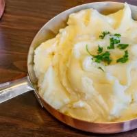 Mashed Potato · Contains dairy. Creamy Mashed Potato with velvety soft butter, lightly salted.