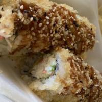 Crunch Roll (8 Pcs) · Avocado, Crab meat, cucumber, and 2 pieces of shrimp tempura inside
Covered with shrimp temp...