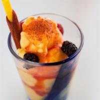 Mango Sorbet · Berries, tajin, tamarind straw, chamoy