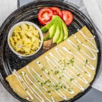 Primavera Crepe · Seasonal veggies, onions, bell peppers, jack cheese, sliced avocado and spinach topped with ...