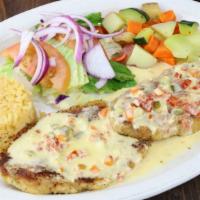 Pollo Al Jalapeño · Grilled chicken breast. Topped with a mild creamy jalapeño sauce & sun dried tomatoes. Serve...
