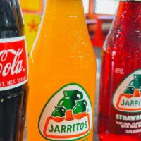 Glass Drinks · Try our Mexican Coca Cola or one of our Jarritos in Mandarin, Pineapple, or Strawberry Favor.
