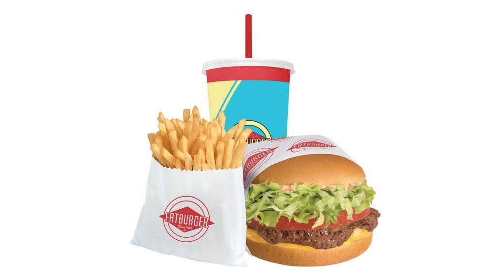 1000 Island Fatburger Meal · This tasty burger’s got tang featuring 100% pure lean beef, fresh ground and grilled to perfection topped with thousand island dressing, lettuce, tomato and American cheese on a toasted sponge-dough bun. Served with choice of fries and a drink.