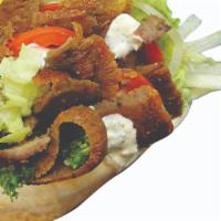 Beef Lamb Donair · Seasoned ground beef with lettuce, tomatoes, cucumbers, onion, pickles, banana peppers, jala...